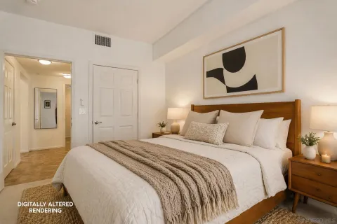 a bedroom with bed and wall painting