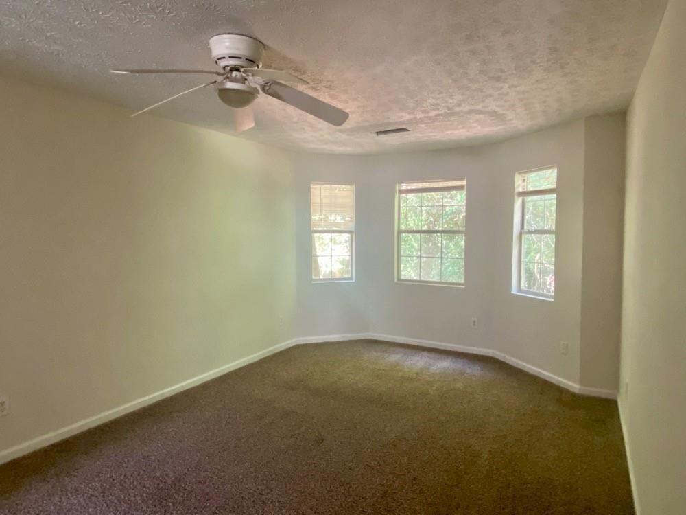 3763 Soapstone Road Decatur, GA 30034 - Photo 6 of 10 a view of an empty room with a window