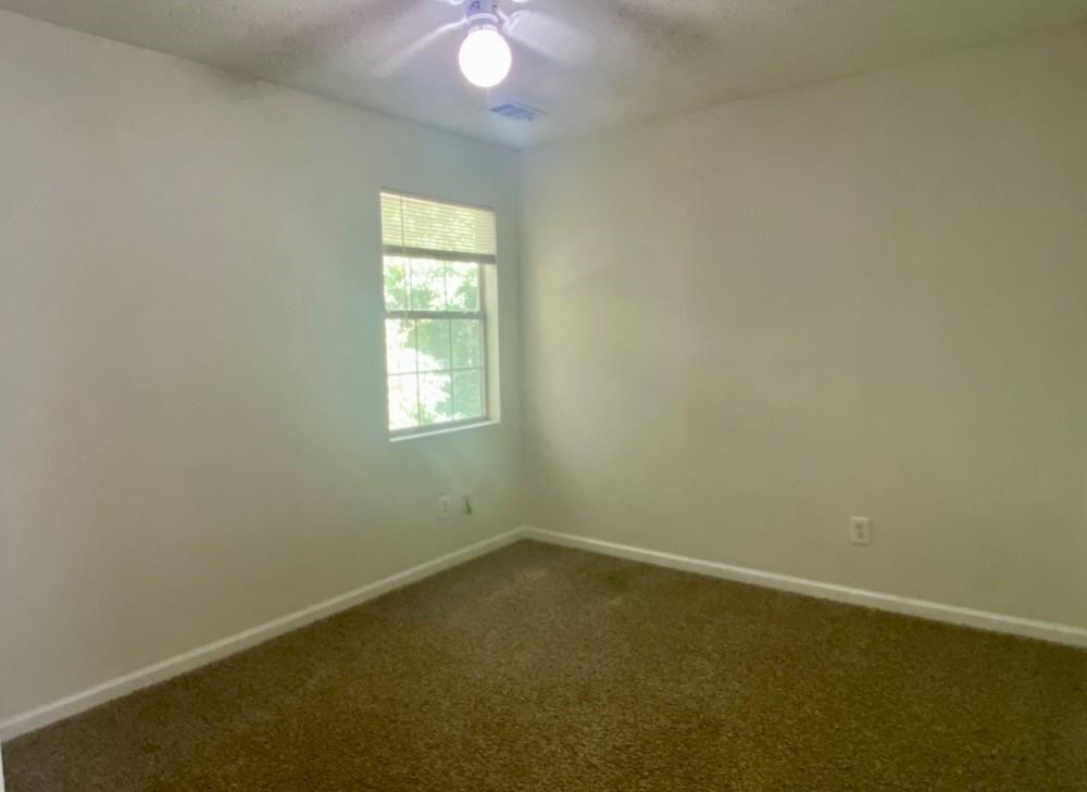 3763 Soapstone Road Decatur, GA 30034 - Photo 8 of 10 an empty room with a window