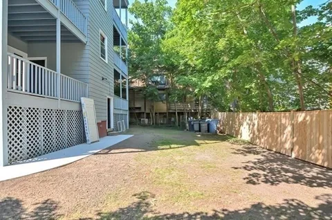 a view of backyard of the house