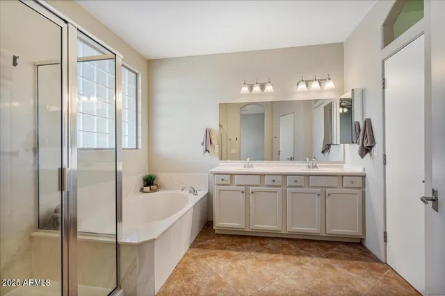 a view of a patio with a table chairs and a fire pit