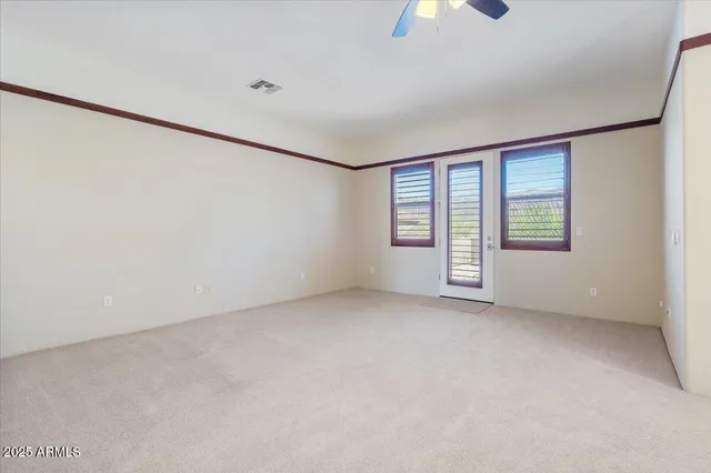 a kitchen with stainless steel appliances granite countertop a sink dishwasher and cabinets with wooden floor