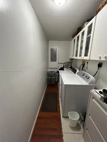 a bathroom with a sink toilet and mirror