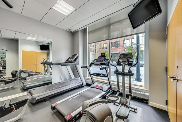 an outdoor sitting area with swimming pool