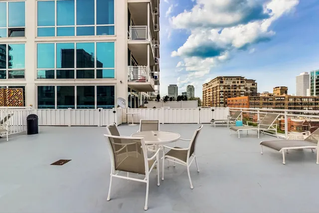 front view of a building with cars