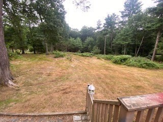 30 Bare Hill Road Boxford, MA 01921 - Photo 8 of 20 a backyard of a house with lots of trees
