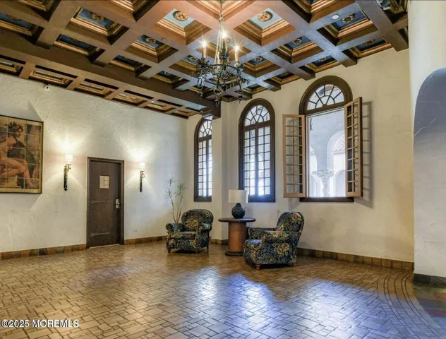 a utility room with multiple dryer and washer