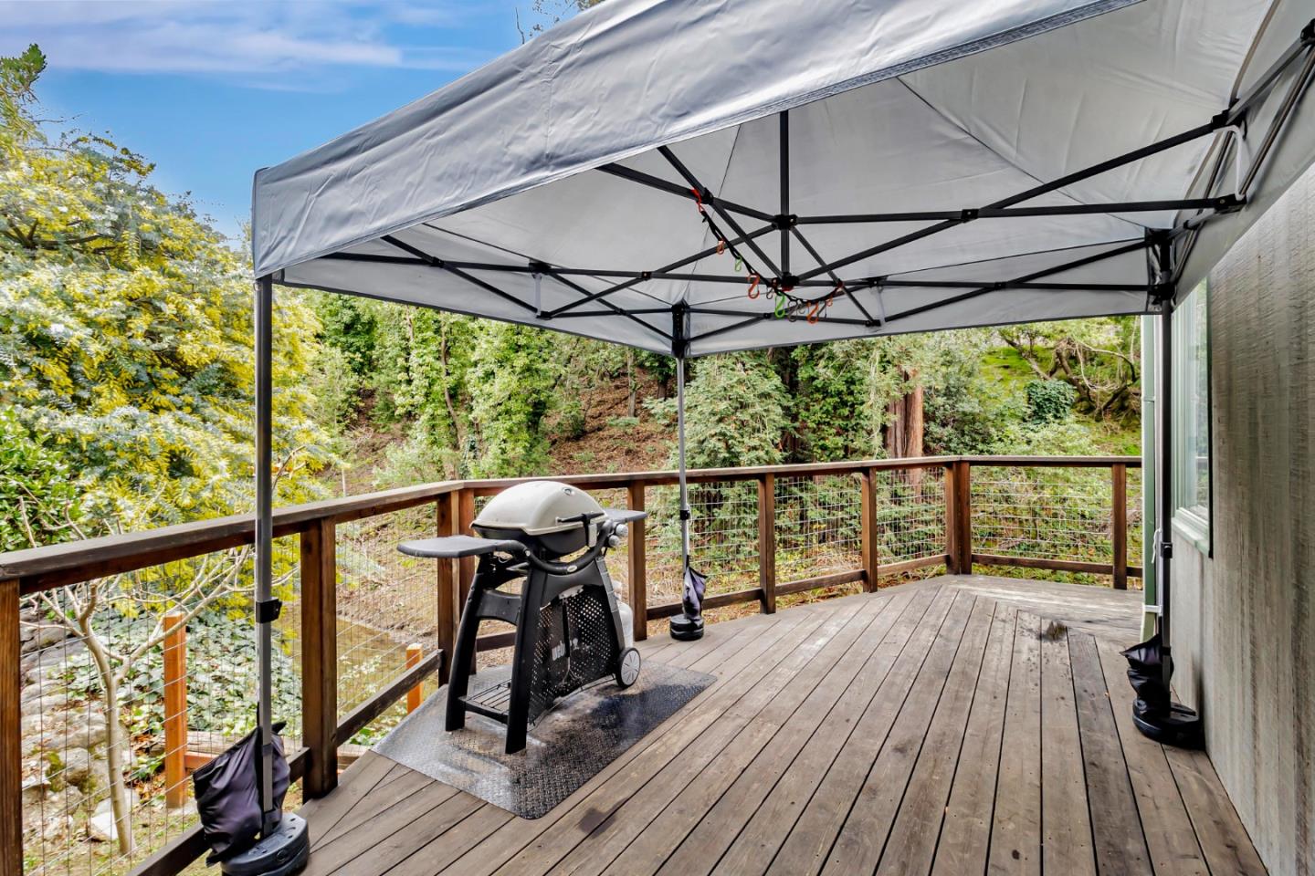 2647 Alpine Road Menlo Park, CA 94025 - Photo 22 of 29 a view of a balcony with chairs and wooden floor