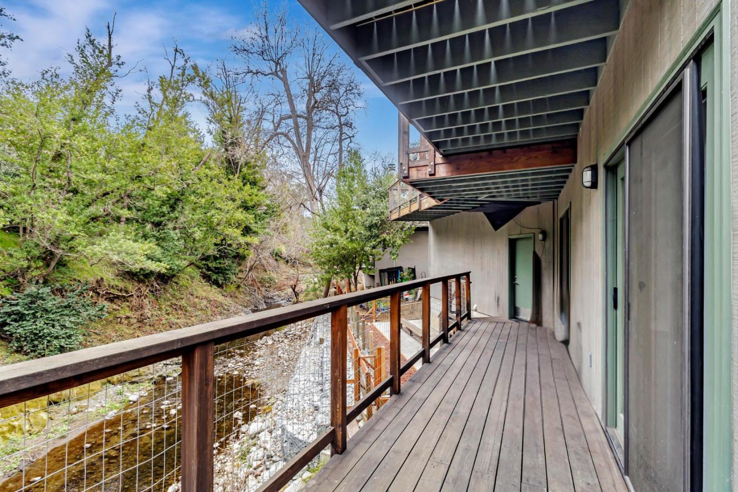 2647 Alpine Road Menlo Park, CA 94025 - Photo 26 of 29 a view of balcony with wooden floor and fence