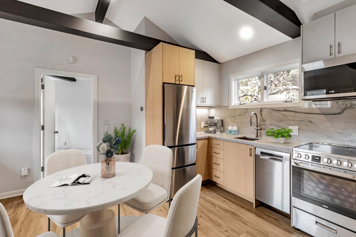 2647 Alpine Road Menlo Park, CA 94025 - Photo 6 of 29 a kitchen with stainless steel appliances a sink a stove a refrigerator cabinets and a dining table