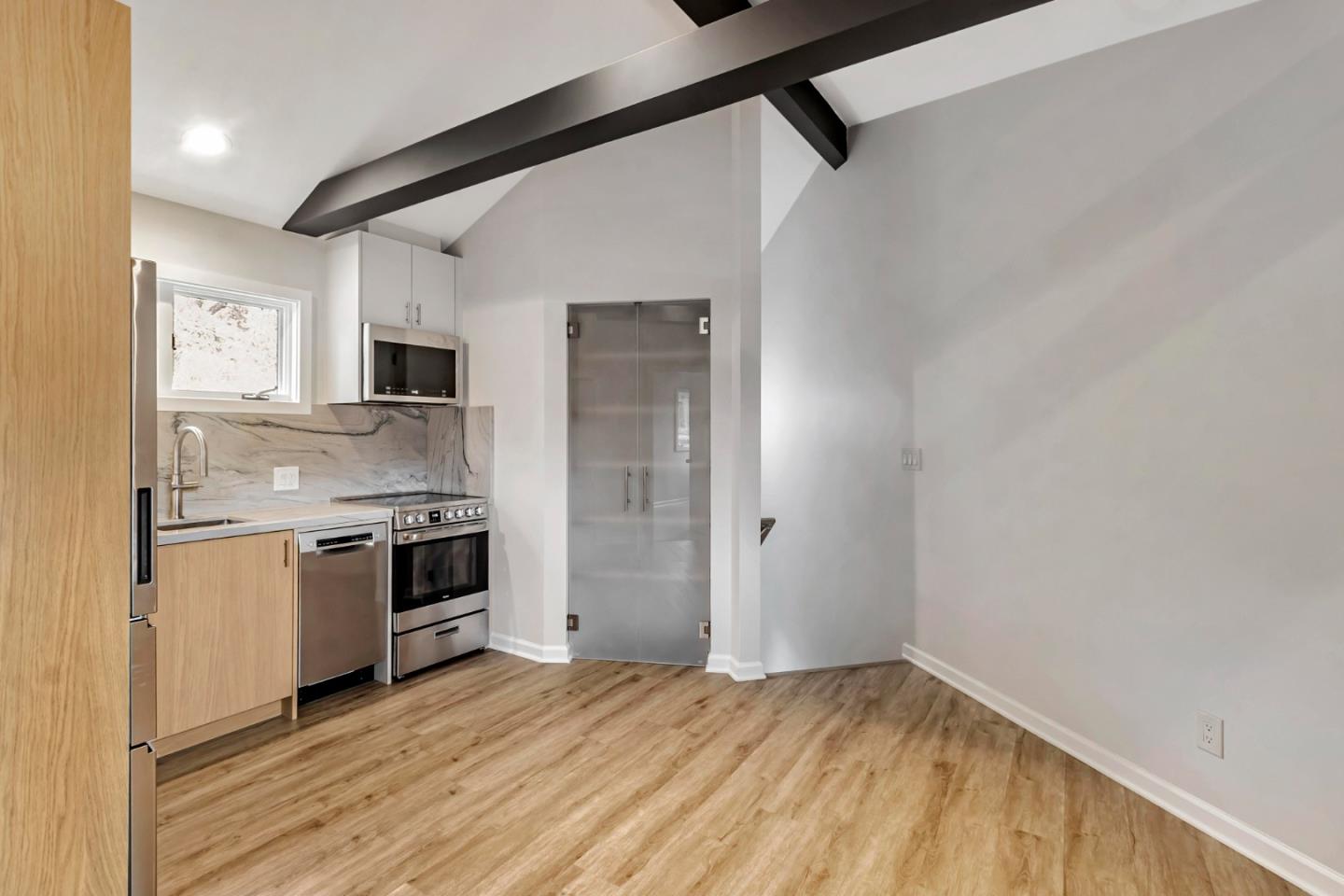 2647 Alpine Road Menlo Park, CA 94025 - Photo 9 of 29 a kitchen with a sink cabinets stainless steel appliances and a window
