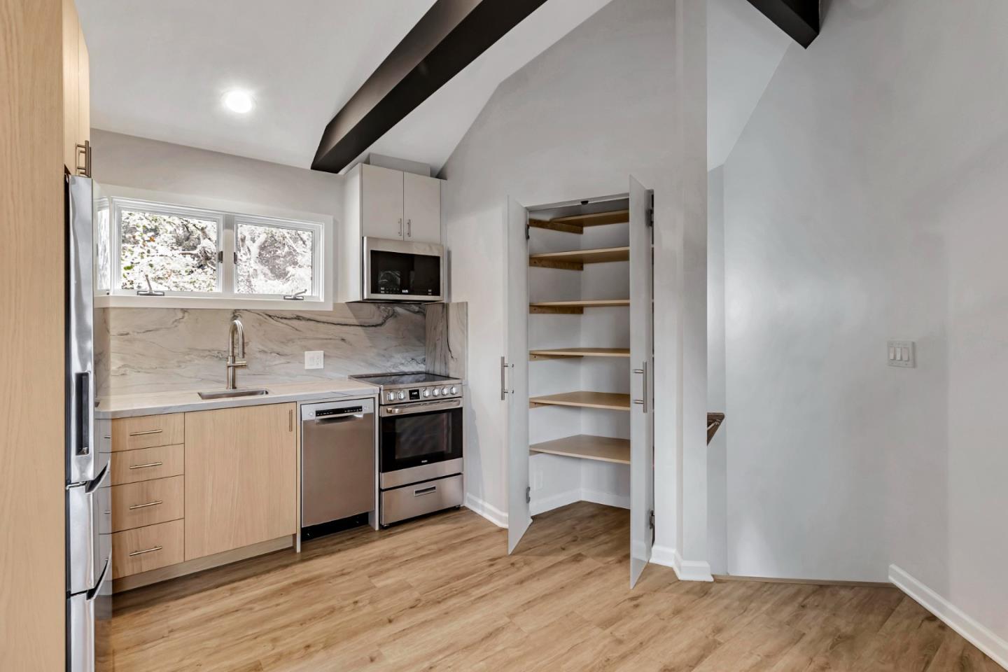 2647 Alpine Road Menlo Park, CA 94025 - Photo 10 of 29 a kitchen with stainless steel appliances a stove and a refrigerator