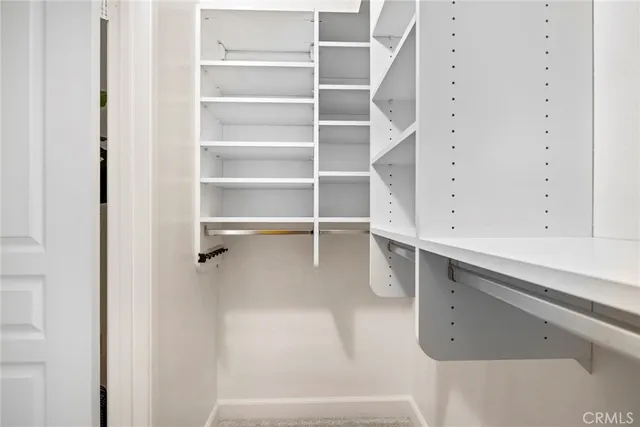 a view of an empty walk in closet