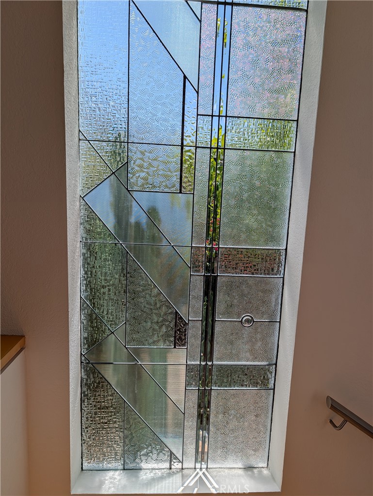 1451 3rd Street Manhattan Beach, CA 90266 - Photo 12 of 23 a bathroom with a glass shower door