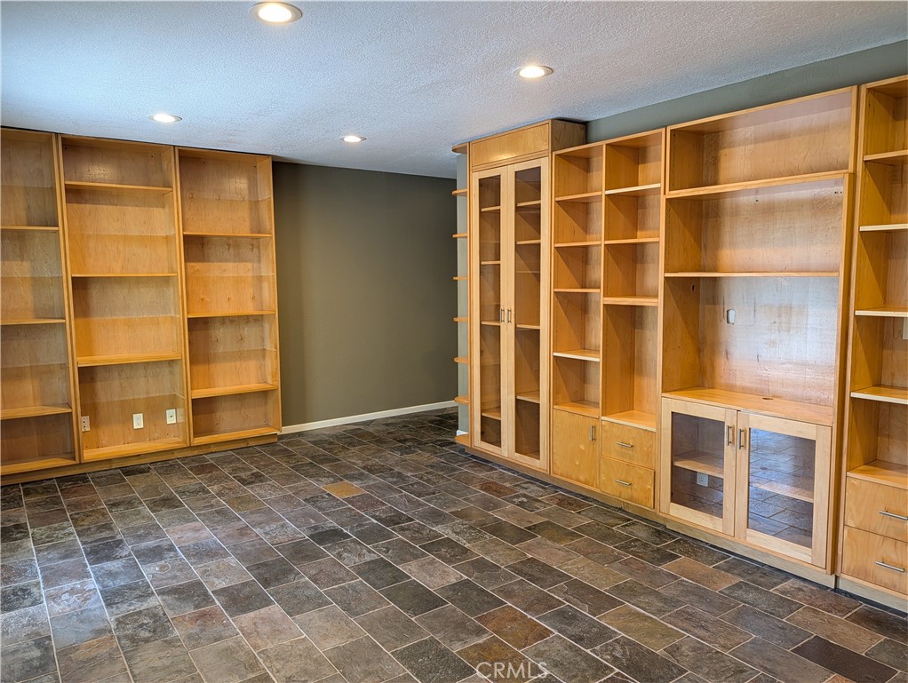 1451 3rd Street Manhattan Beach, CA 90266 - Photo 15 of 23 a view of an empty room with a wooden door