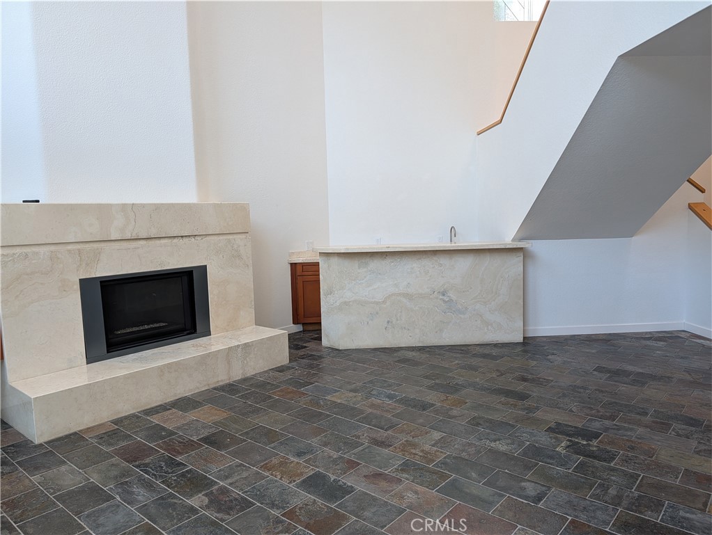 1451 3rd Street Manhattan Beach, CA 90266 - Photo 17 of 23 a view of an empty room with a fireplace