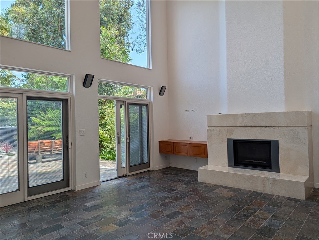 1451 3rd Street Manhattan Beach, CA 90266 - Photo 19 of 23 a view of a livingroom with a fireplace and a window