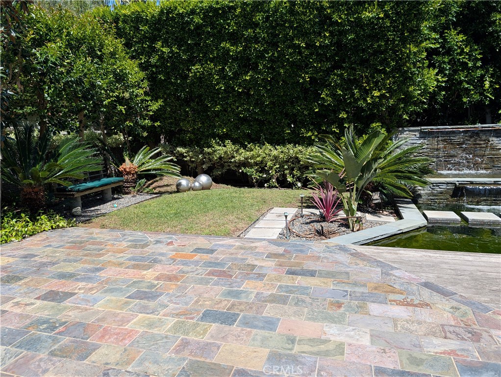 1451 3rd Street Manhattan Beach, CA 90266 - Photo 22 of 23 a view of a backyard of a house