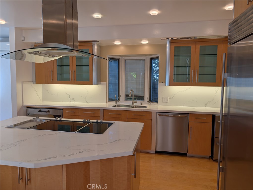 1451 3rd Street Manhattan Beach, CA 90266 - Photo 5 of 23 a kitchen with stainless steel appliances granite countertop a sink and a refrigerator