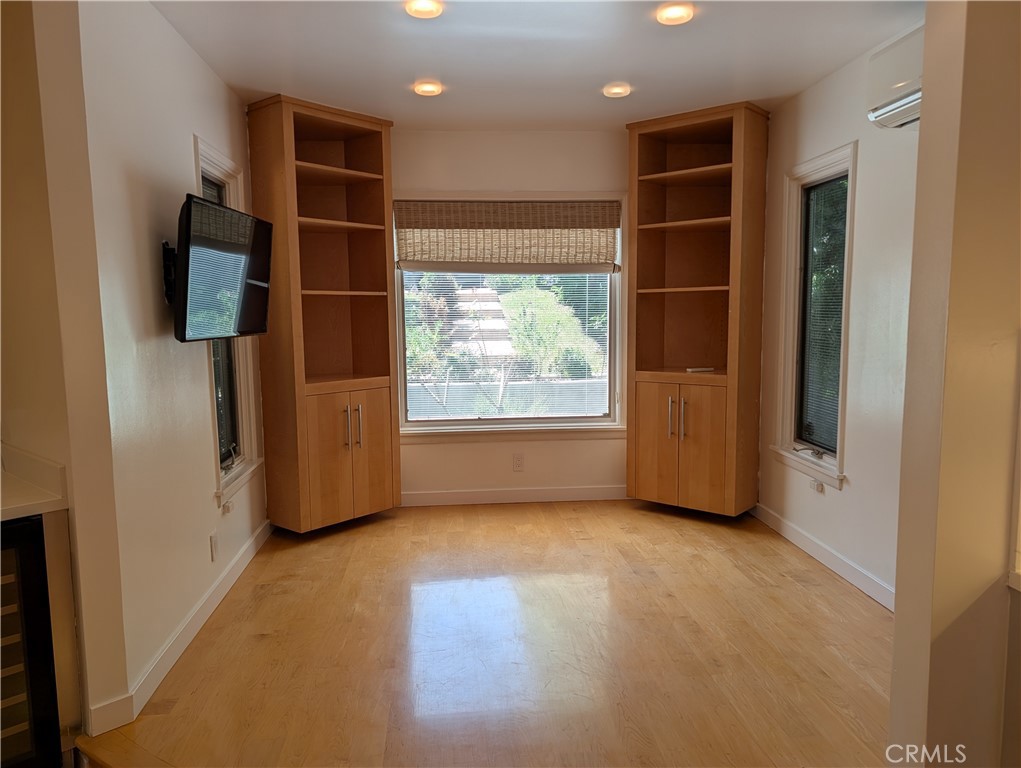 1451 3rd Street Manhattan Beach, CA 90266 - Photo 7 of 23 an empty room with windows and closet