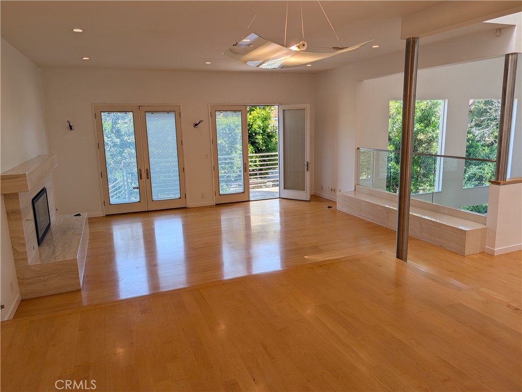 1451 3rd Street Manhattan Beach, CA 90266 - Photo 9 of 23 a view of an empty room with window and cabinet