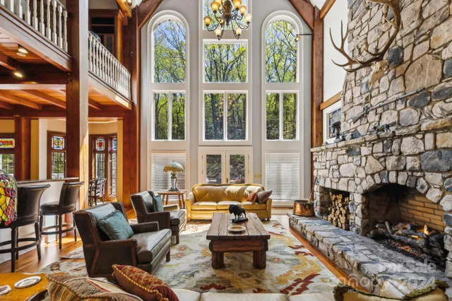 a outdoor living space with furniture and floor to ceiling windows