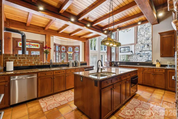 a kitchen that has a lot of cabinets in it