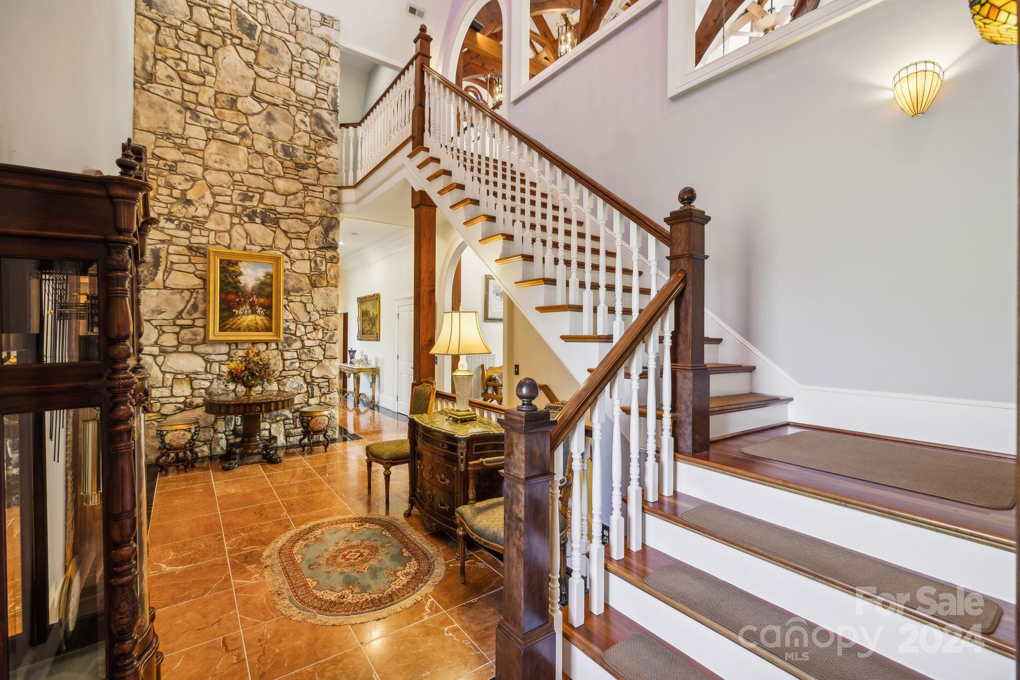 5712 Summit Road Purlear, NC 28665 - Photo 34 of 48 a view of entryway livingroom and hall with wooden floor