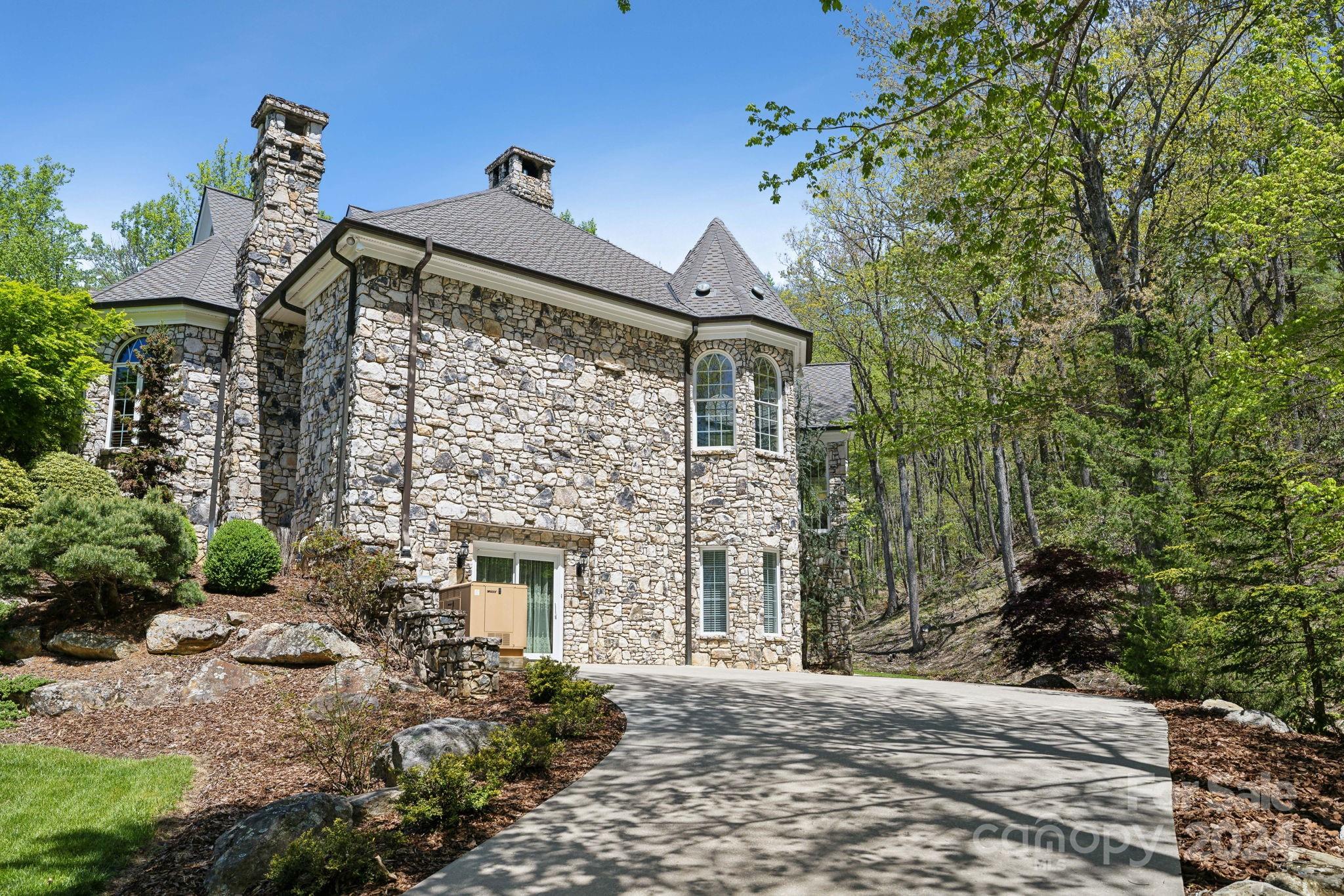 5712 Summit Road Purlear, NC 28665 - Photo 5 of 48 a front view of a house with a yard