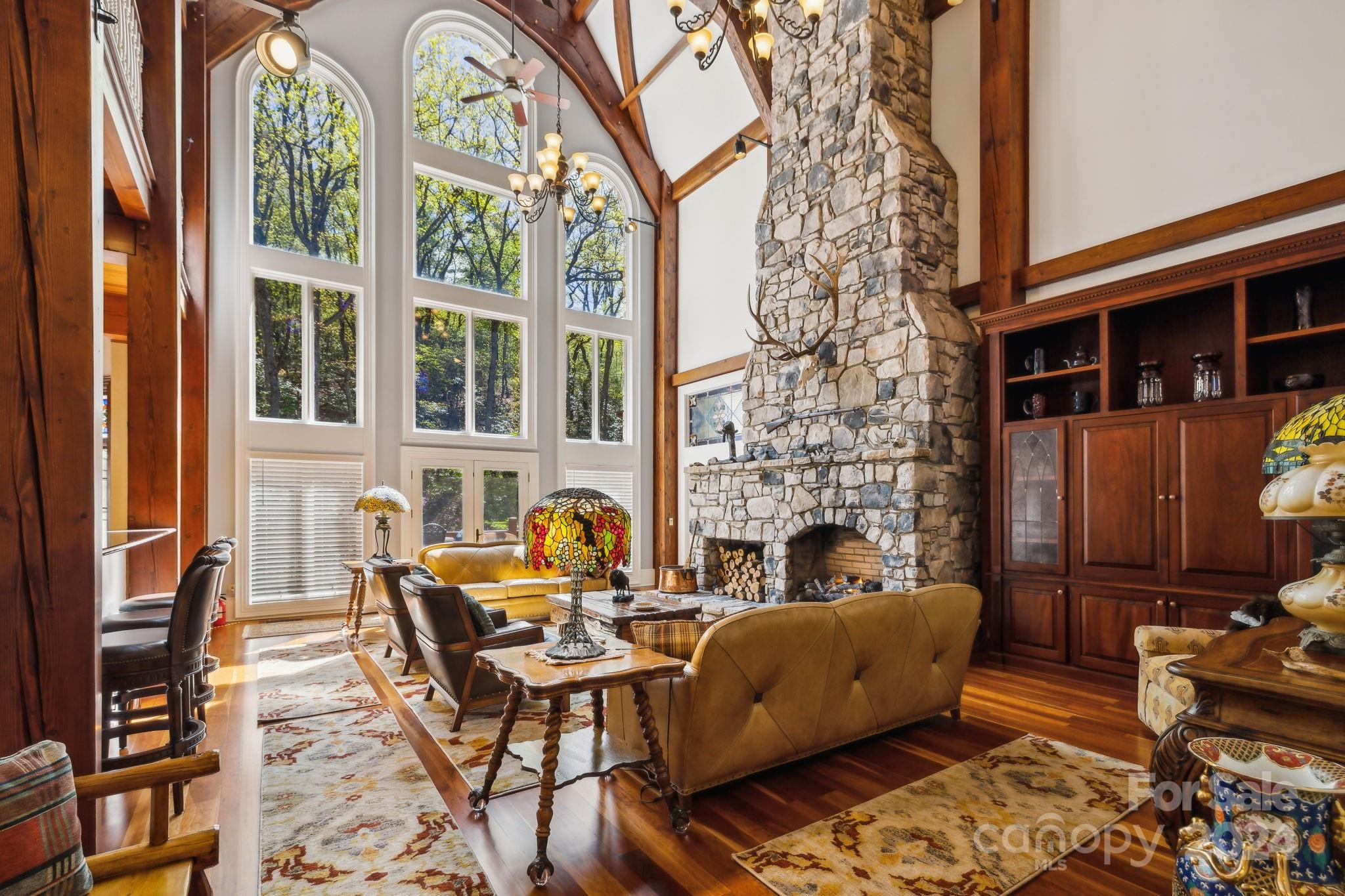 5712 Summit Road Purlear, NC 28665 - Photo 9 of 48 a living room with furniture a rug and a window