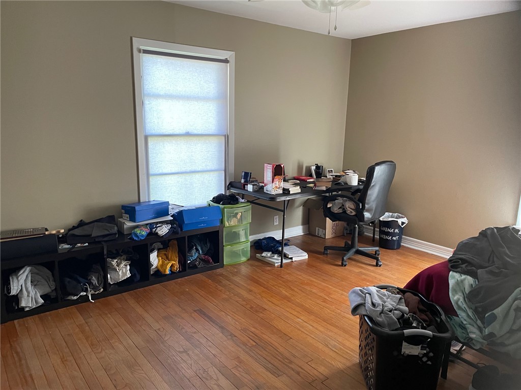 4400 Oaklawn Street Bryan, TX 77801 - Photo 5 of 7 a room with furniture a rug and a window