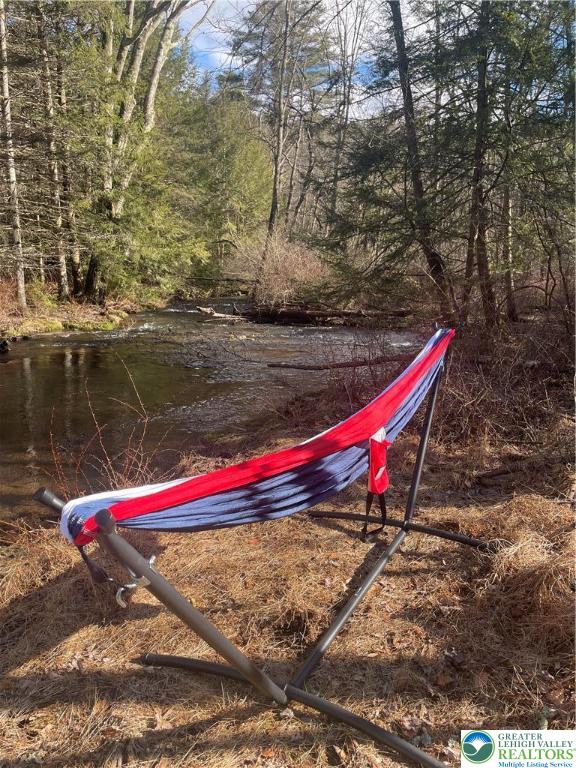 444 Lower Middle Creek Road Kunkletown, PA 18058 - Photo 4 of 14 a view of a bench with wooden fence