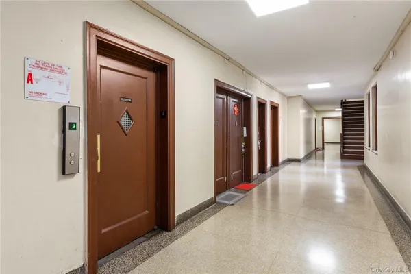a view of a hallway with entryway