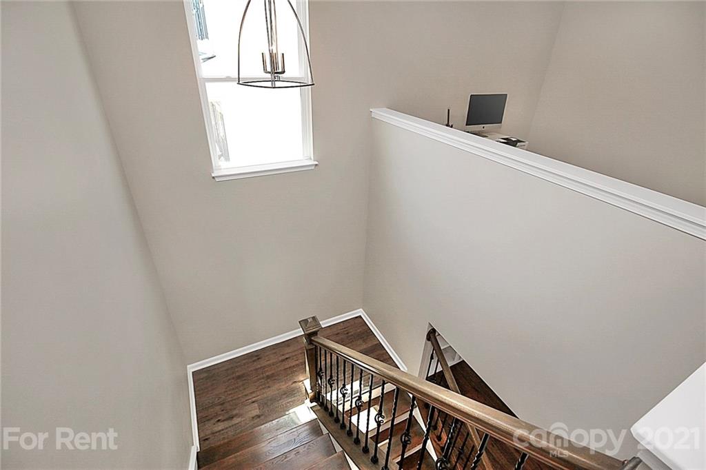 4925 Grace View Drive Pineville, NC 28134 - Photo 25 of 41 a view of a hallway with windows