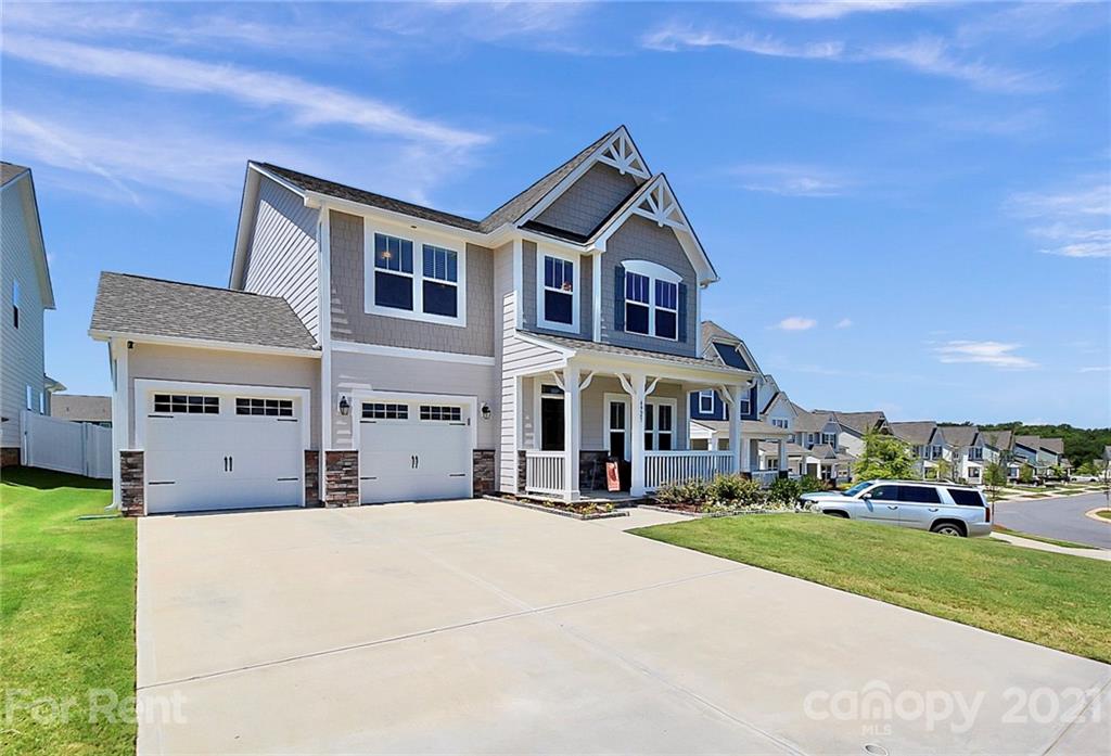 4925 Grace View Drive Pineville, NC 28134 - Photo 39 of 41 a front view of a house with a yard