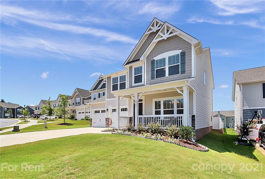 4925 Grace View Drive Pineville, NC 28134 - Photo 40 of 41 a front view of a building with swimming pool