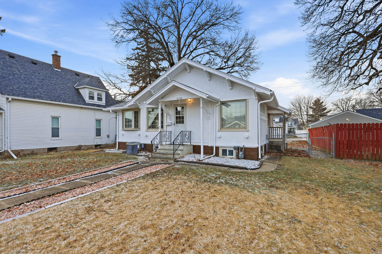 2748 12th Avenue Moline, IL 61265 - Photo 34 of 35 a view of a house with a yard and garage