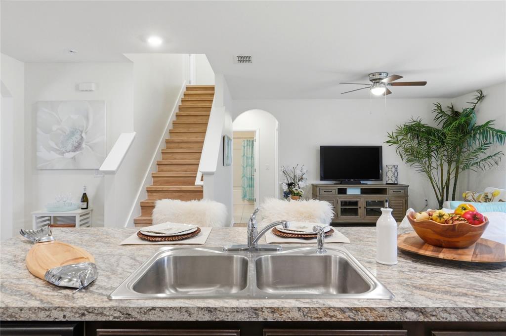 416 Corso Loop Winter Haven, FL 33884 - Photo 14 of 73 a living room with furniture and a flat screen tv