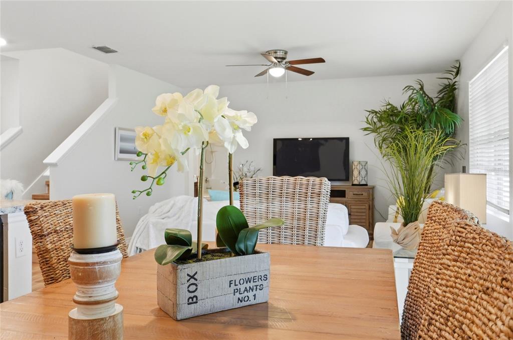 416 Corso Loop Winter Haven, FL 33884 - Photo 20 of 73 a living room with furniture flowerpot and flower pot