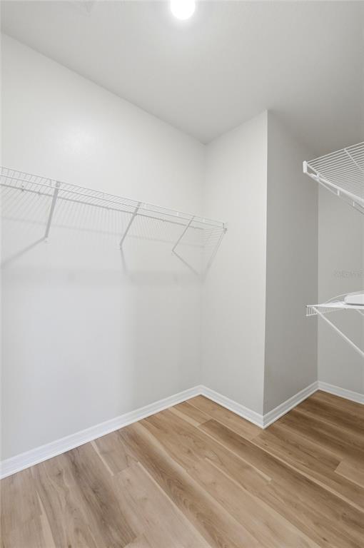 416 Corso Loop Winter Haven, FL 33884 - Photo 43 of 73 a view of a room with racks on the wall