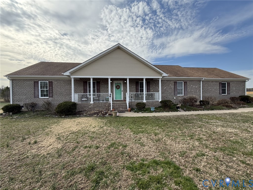 a front view of a house with yard