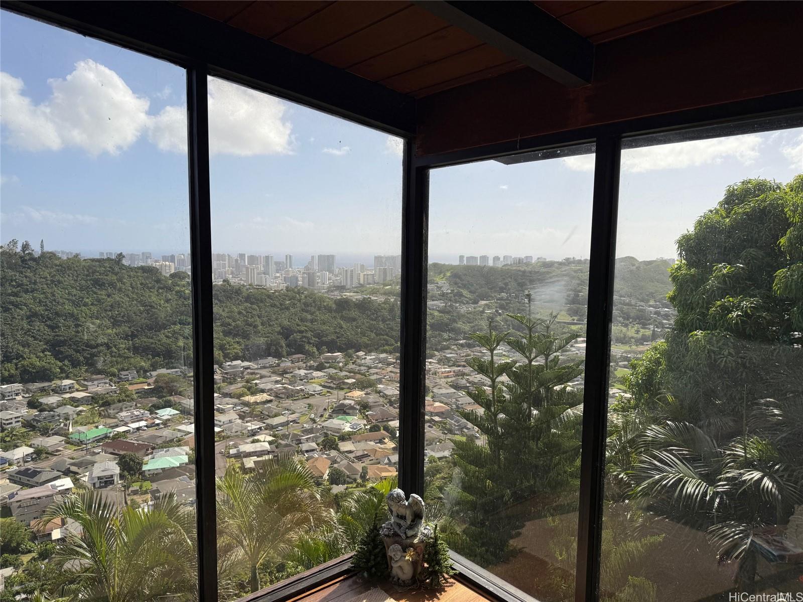 2841 Pacific Heights Road Honolulu, HI 96813 - Photo 1 of 19 a view of a glass door and porch