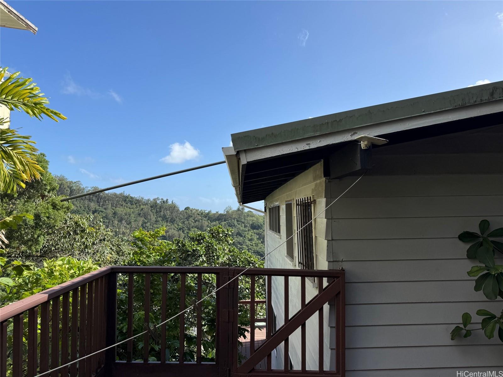 2841 Pacific Heights Road Honolulu, HI 96813 - Photo 18 of 19 a view of balcony with wooden floor and fence