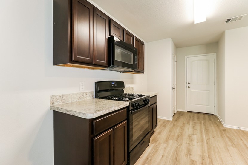2743 Madison Court Conroe, TX 77304 - Photo 5 of 15 Photos may be representative of the floor plan and not the exact home. Finishes, layout, and features of the actual property for lease may vary.