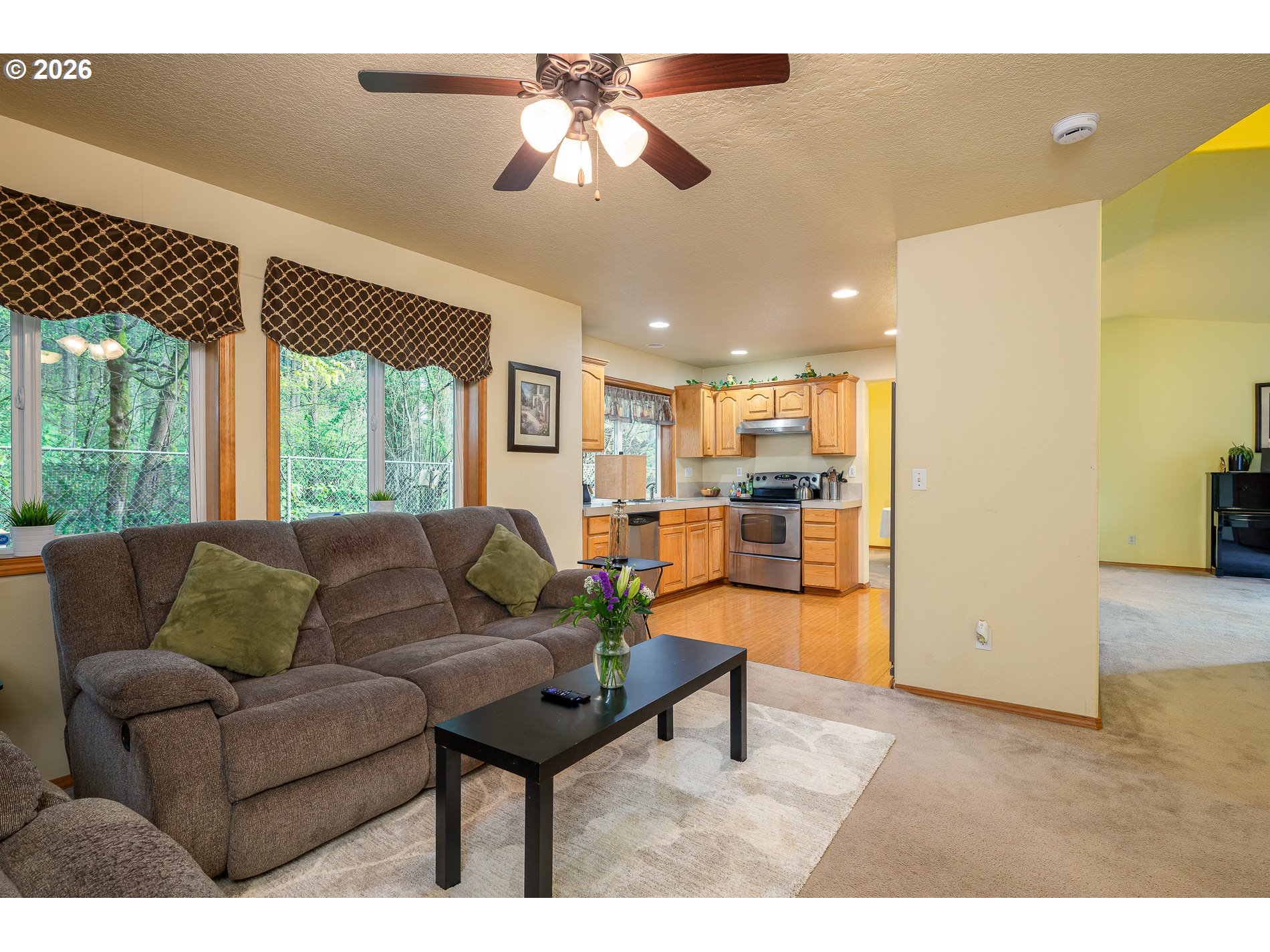 14300 Southeast Center Street Portland, OR 97236 - Photo 19 of 48 a living room with furniture and a large window