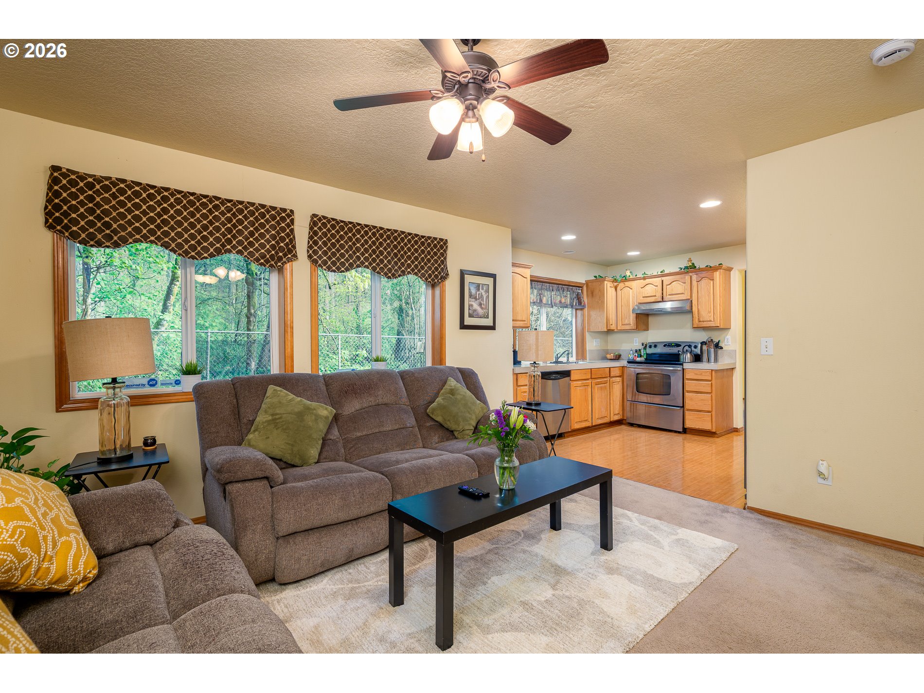 14300 Southeast Center Street Portland, OR 97236 - Photo 20 of 48 a living room with furniture and a large window