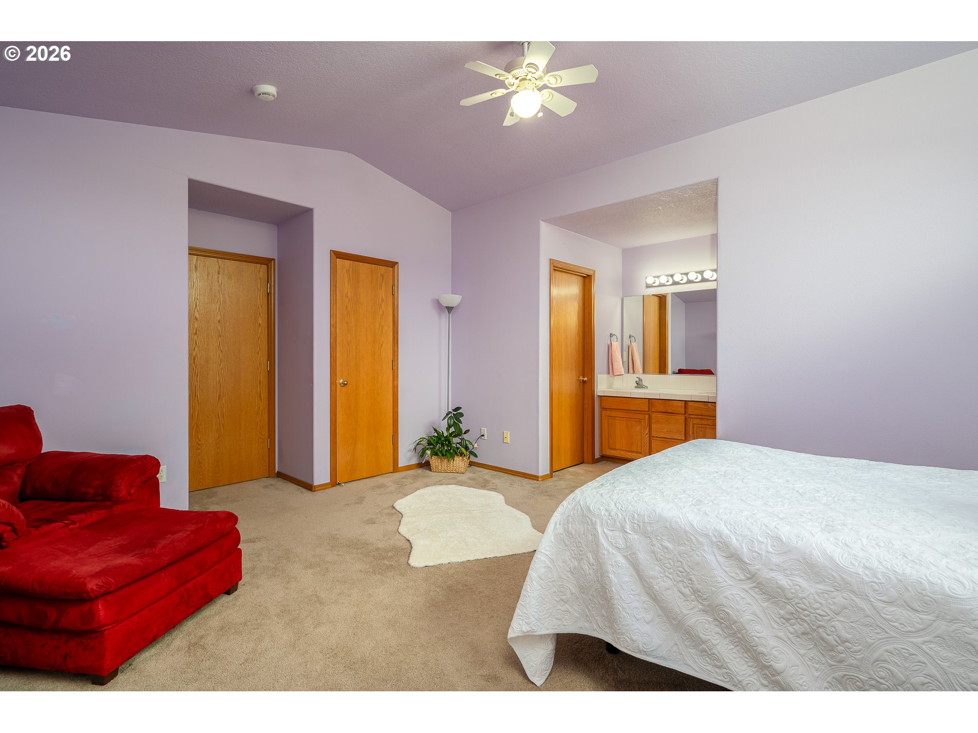 14300 Southeast Center Street Portland, OR 97236 - Photo 23 of 48 a bedroom with a bed and a couch