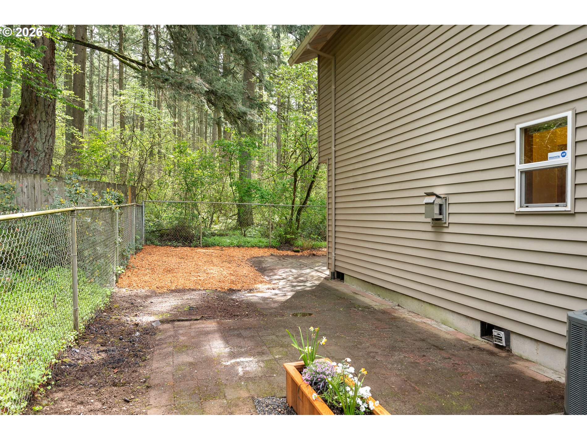 14300 Southeast Center Street Portland, OR 97236 - Photo 32 of 48 a view of backyard of the house