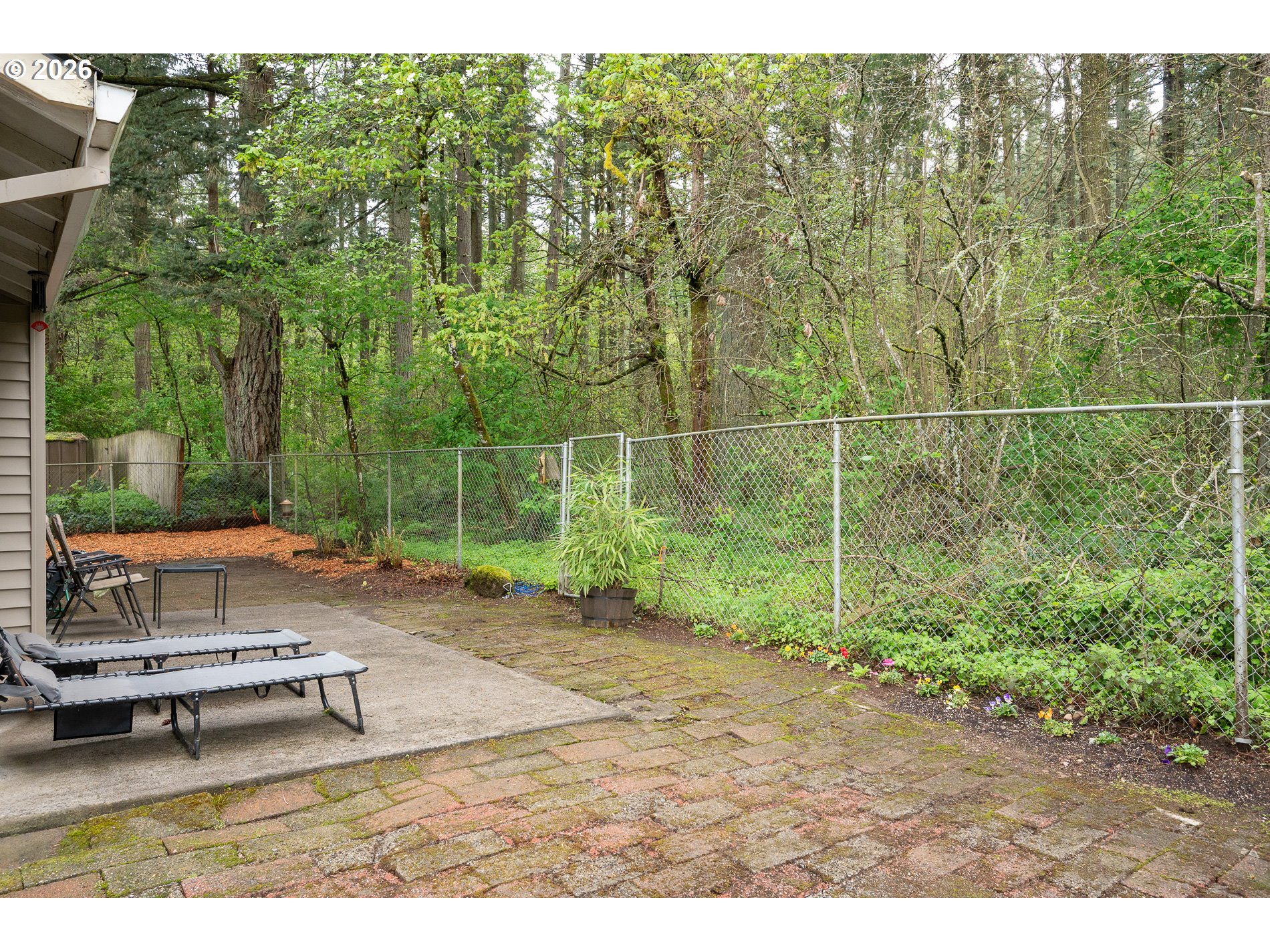 14300 Southeast Center Street Portland, OR 97236 - Photo 38 of 48 a backyard of a house with outdoor seating