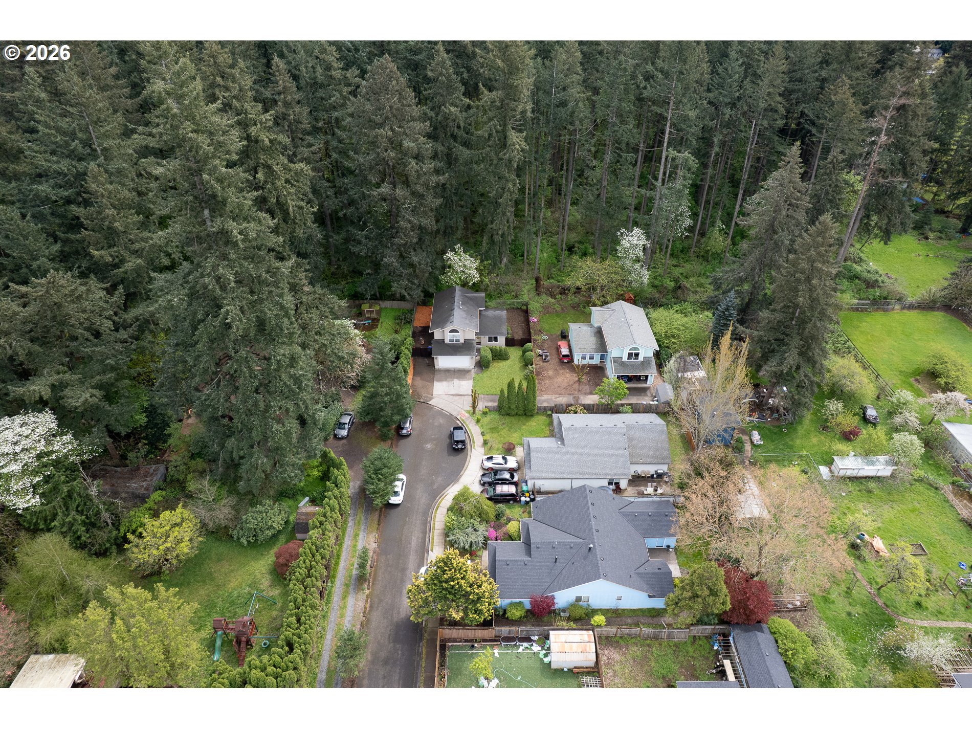 14300 Southeast Center Street Portland, OR 97236 - Photo 42 of 48 a view of a house with a yard and sitting area